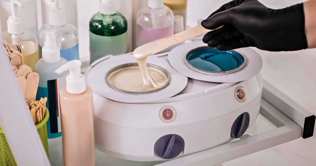 Beauty salon wax warmer with skincare products