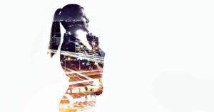 Double exposure woman silhouette city skyline