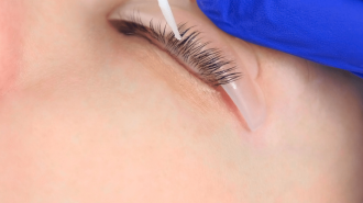 Eyelash extension application process close-up